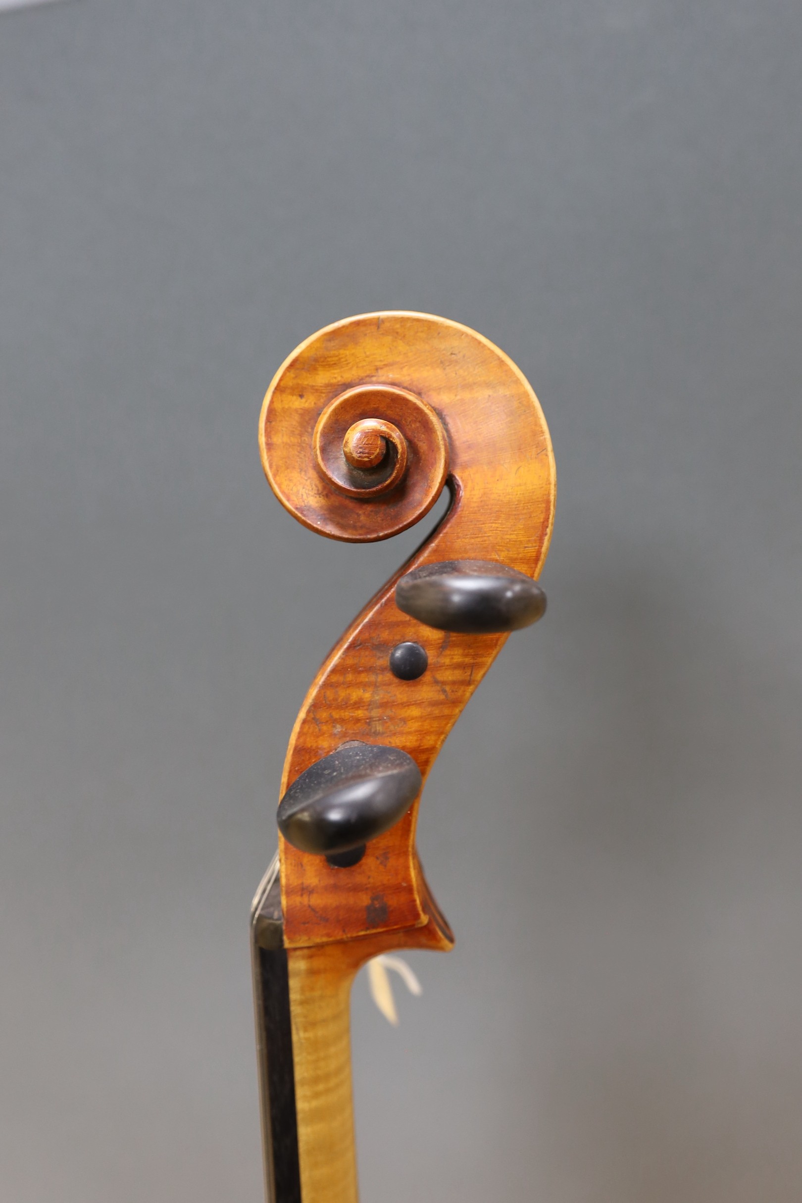 An early 20th century French half size cello, with soft case and bow